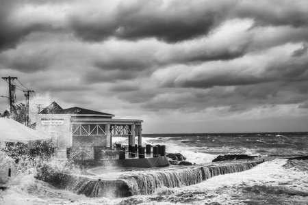 Grand Cayman, Cayman Islands, Dec 2017, storm over the Caribbean Sea by the South terminal of George Town Portのeditorial素材