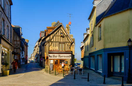 Domfront, France, Feb 2019, exterior of the half timbered building of the restaurant "Au Bar Normand" in a medieval town of Normandyのeditorial素材