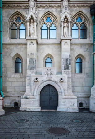 Budapest, Hungary, Aug 2019, view of a side door of the church of the Buda Castle, known as Matthias Churchのeditorial素材