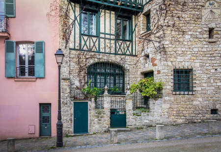 Paris, France, Fev 2020, house in  "Rue de l'Abreuvoir" in the heart of Montmartreのeditorial素材