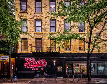 New York City, USA, May 2019, facade of a building with Kiehl's cosmetics store in Hell's Kitchen, Manhattanのeditorial素材