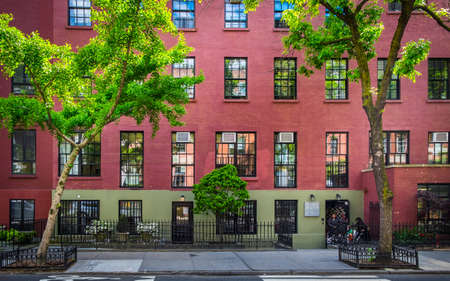 New York City, USA, May 2019, view of a red brick buildings at the street level in the Chelsea...