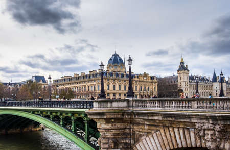 Paris, France, Feb 2020, view of Notre-Dame bridge spanning over the Seine riverのeditorial素材