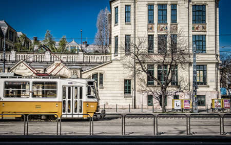 Budapest, Hungary, March 2020, view of a tram passing by a building in Lehel streetの写真素材