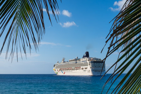 Grand Cayman, Cayman Islands, Feb 2023, view of the Norwegian Dawn cruise ship on the Caribbean Sea moored by George Townの写真素材