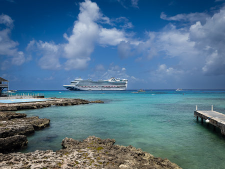 Grand Cayman, Cayman Islands, June 12th 2023, view of the Caribbean Princess cruise ship on the Caribbean Sea moored by George Townの写真素材