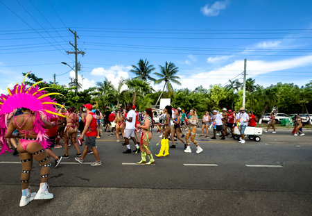Grand Cayman, Cayman Islands, July 1st, 2023, carnival goers parading during CayMas Carnival on West Bay Roadの写真素材