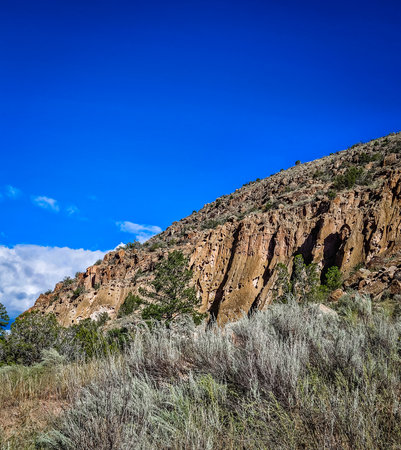 View of a rock formation in Bandelier National Monument on the Pueblo Loop Trailの写真素材
