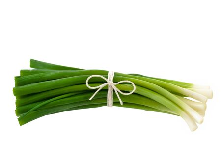Green shallots on pure white backgroundの写真素材