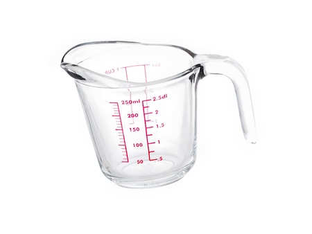 Glass mesuring cup on pure white backgroundの写真素材