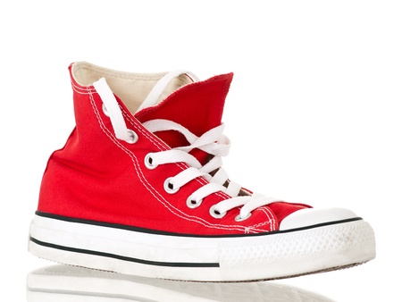 Vintage red shoe side view on pure white backgroundの写真素材