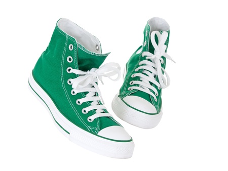 Vintage hanging green shoes on pure white backgroundの写真素材