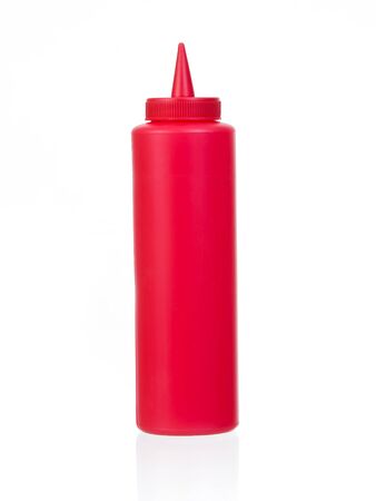 ketchup bottle isolated on a white backgroundの写真素材
