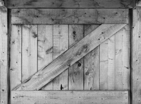 Small barn window shutter in black and white