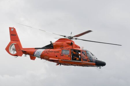 US Coast Guard Helicopter with rescue swimmer, Port Angeles, WAのeditorial素材