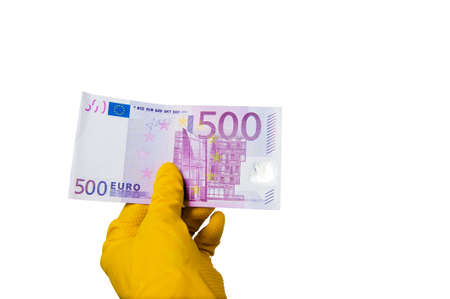 Money. Gloved hands with banknotes. Money from different countries. Money on white background.
