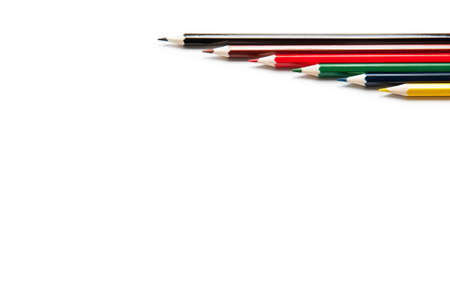 Colored pencils and eraser on white background. Several different pencils.の写真素材
