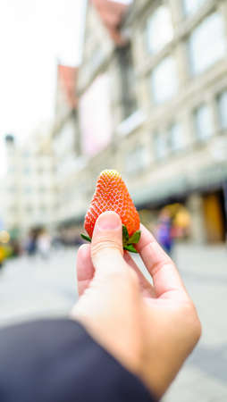 strawberry on handの写真素材