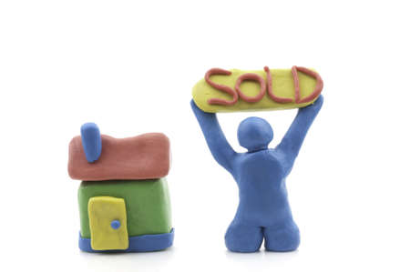 Man and House made from Modeling clay with word sold.の写真素材