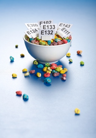 Unhealthy food: popped wheat seeds with lots of food additive chemicalsの写真素材