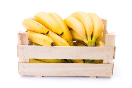 Ripe bananas in wooden box. Musa acuminataの写真素材