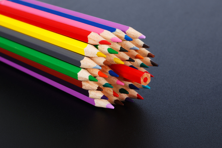 Concept with colored pencils - opposition to the majorityの写真素材