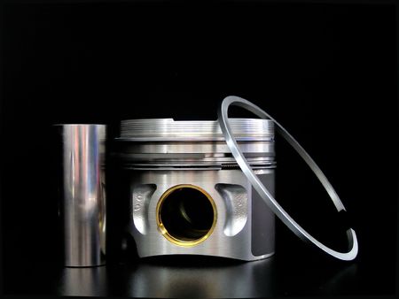 Piston with piston ring isolated on blackの写真素材