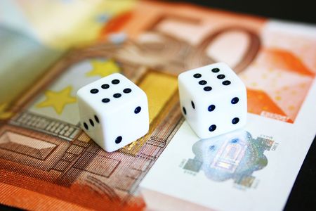 A pair of dices and moneyの写真素材