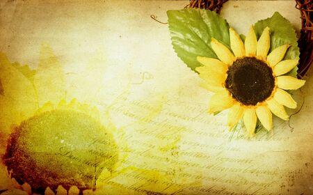 Grunge retro background with sunflowers and copy spaceの写真素材