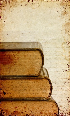 Grunge retro background with old books and copy space の写真素材