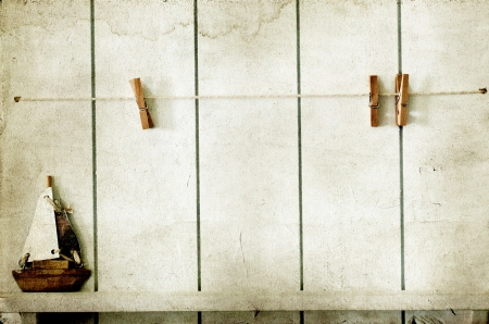 Vintage background with boat, clothesline and clothespins の写真素材