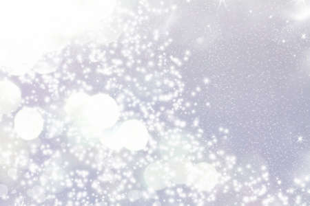 Abstract Christmas background of silver holiday lights 