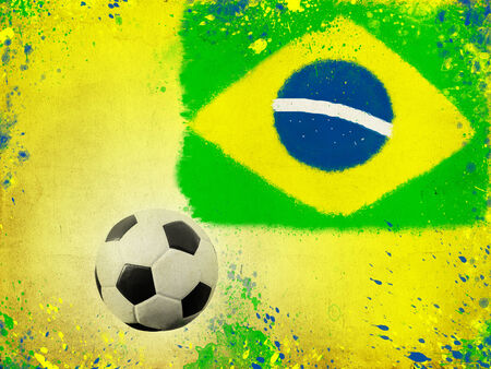 Photo of soccer ball and the colors of the Brazil flagの写真素材