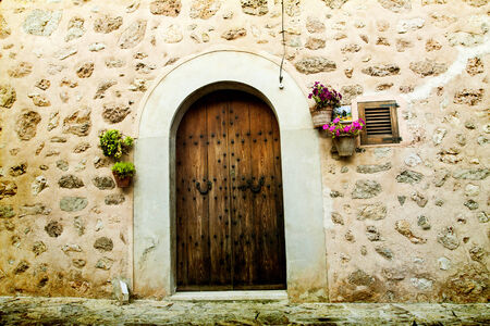 Vintage photo of traditional house in mediterranean village Valldemossa Mallorca, Spainの写真素材