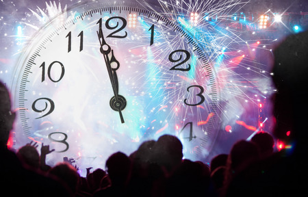 Fireworks and crowd celebrating the New yearの写真素材