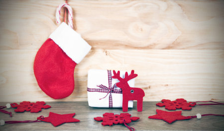 Christmas decorations on rustic wooden backgroundの写真素材