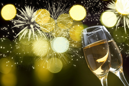 Champangne glasses on sparkling backgroundの写真素材