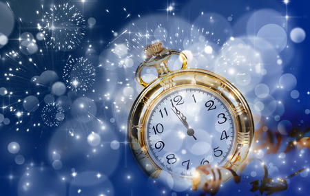 New Year's at midnight - Old clock with stars snowflakes and holiday lights