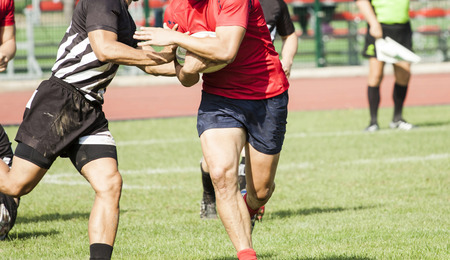 Two rugby players during the gameの写真素材