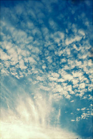 Retro styled photo of beautyful blue sky and clouds