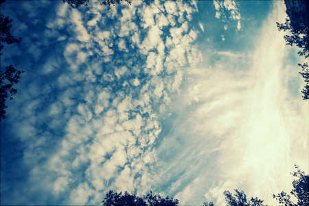 Retro styled photo of beautyful blue sky and clouds