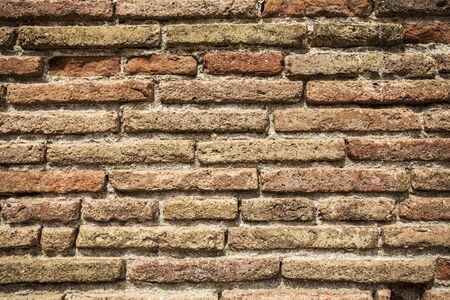 Brown brick wall - grunge background