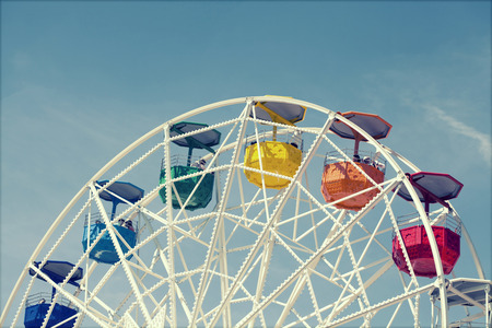 Classic ferris wheel over blue sky