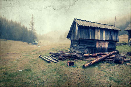 Vintage photo of autumn rural landscape in the mountainsの写真素材