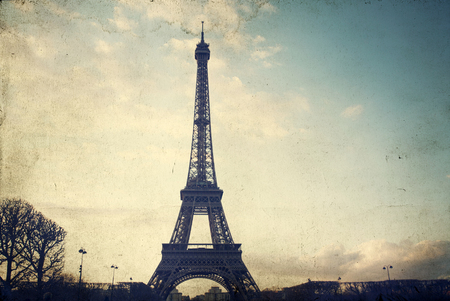 Vintage photo of Eiffel Tower in Paris, France, with grunge effectの写真素材