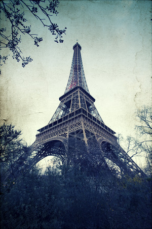 Vintage photo of Eiffel Tower in Paris, France, with grunge effectの写真素材