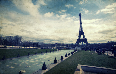 Vintage photo of Eiffel Tower in Paris, France, with grunge effectの写真素材