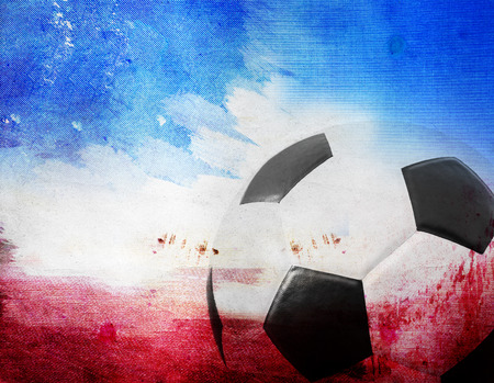 Soccer ball on red,blue, and white backgroundの写真素材