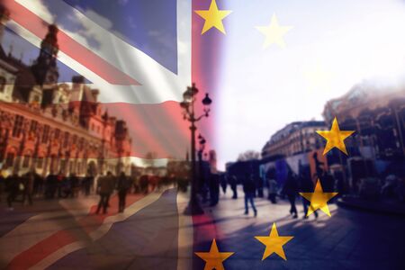 United Kingdom and European union flags combined for Brexit - London cityscape in the backgroundの写真素材