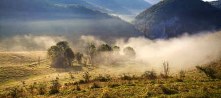 Early morning landscape in the Carpathian mountains in Transylvania, Romaniaの写真素材